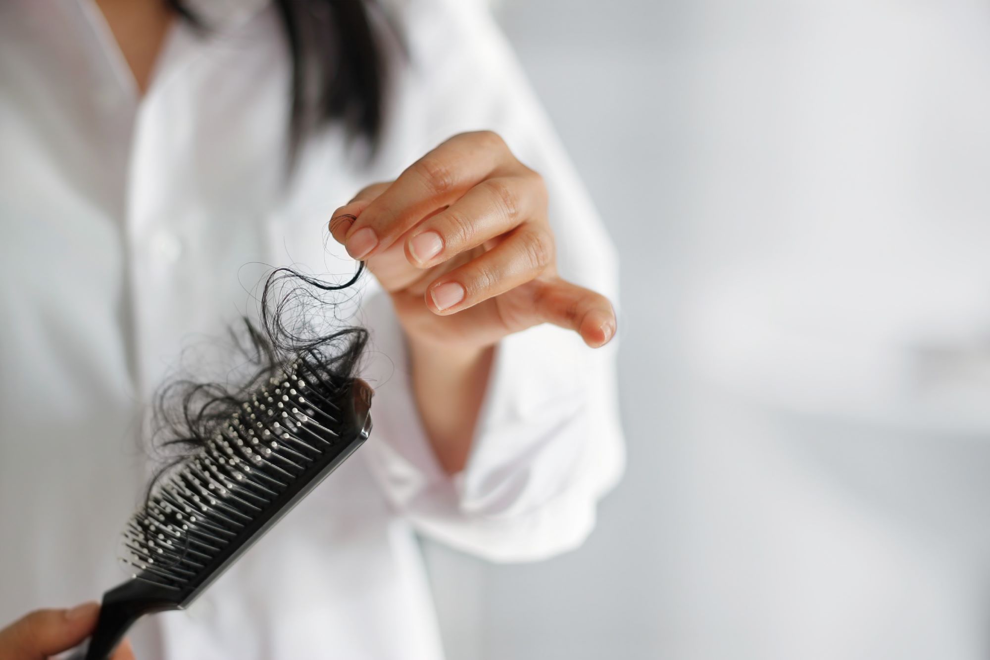 How To Stop Postpartum Hair Loss Using Products That Actually Work